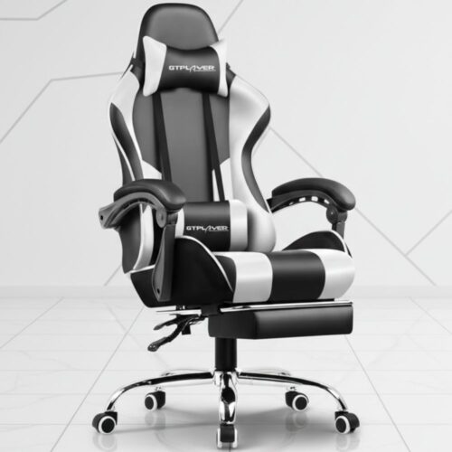 black and red ergonomic gaming chair with footrest and lumbar support