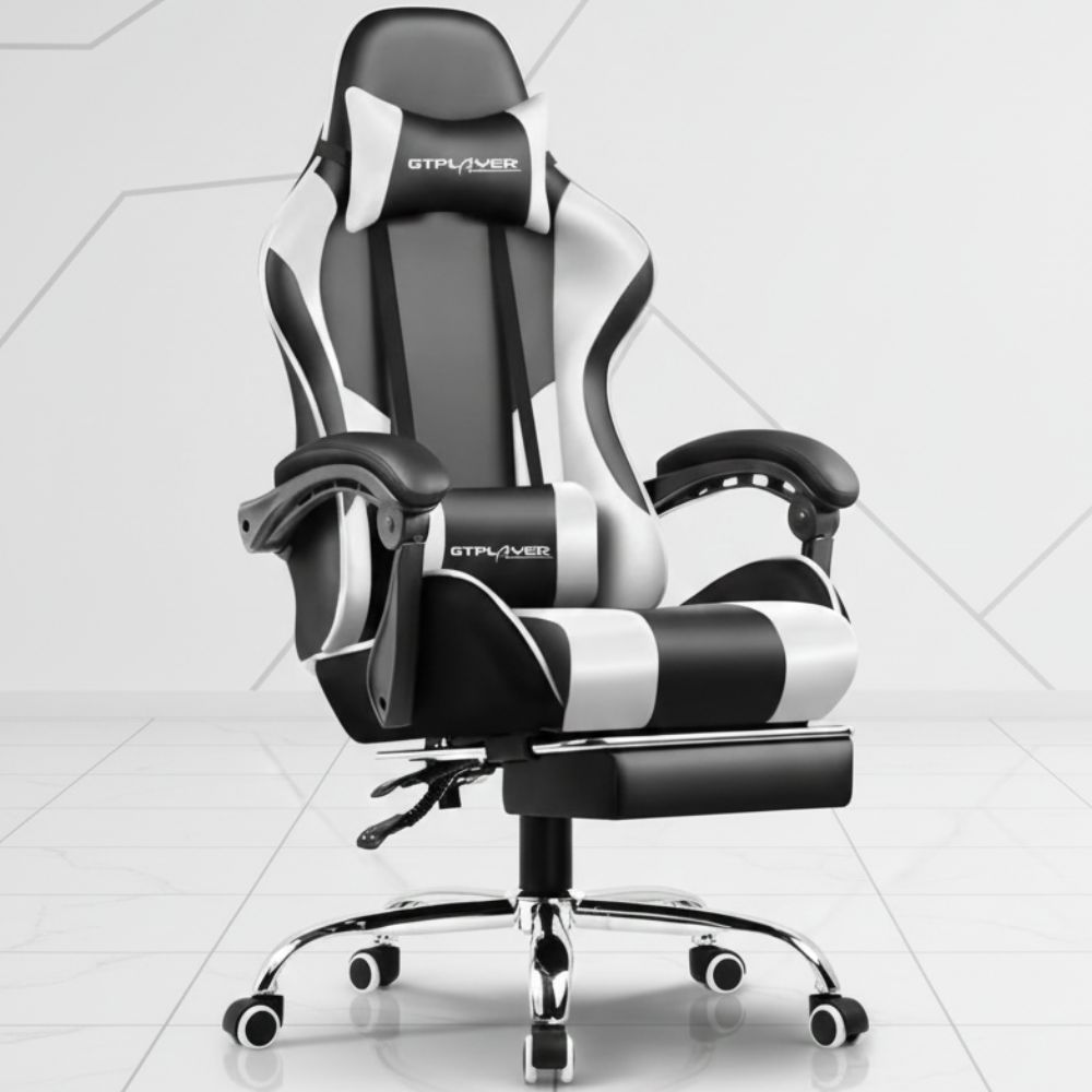 black and red ergonomic gaming chair with footrest and lumbar support