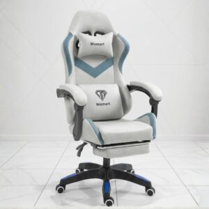 black gaming chair with footrest and lumbar support
