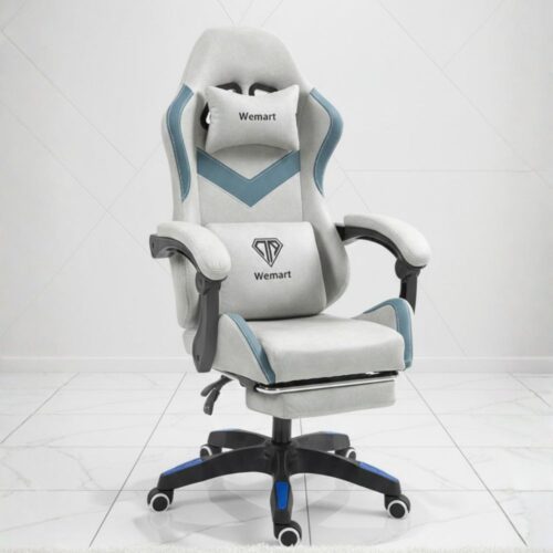 black gaming chair with footrest and lumbar support
